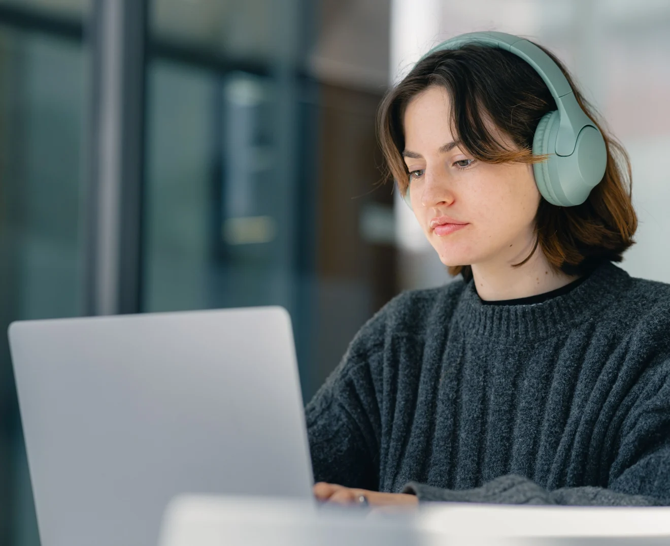 Online MBA student doing work on her computer