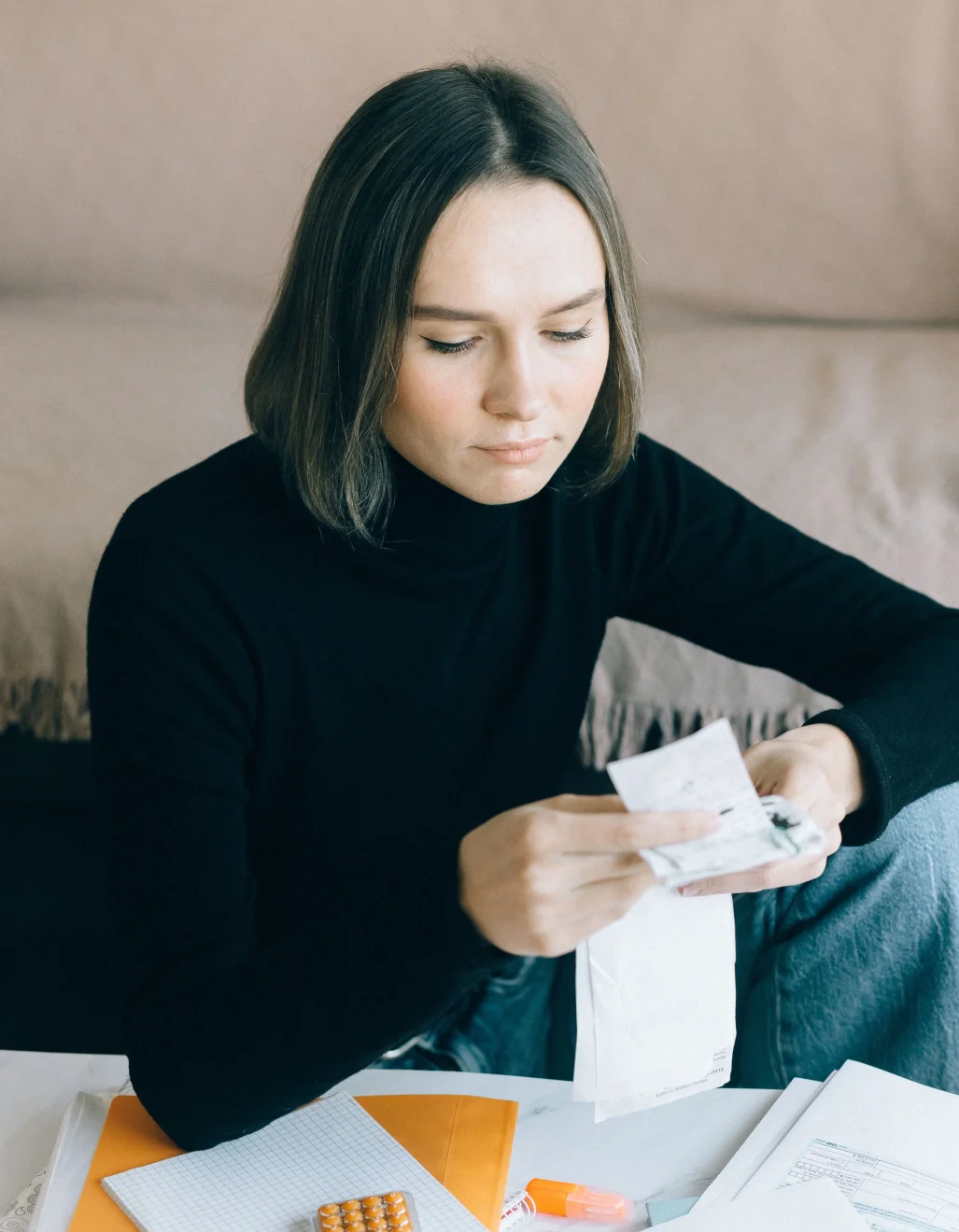 Person contemplating the cost of an MBA program